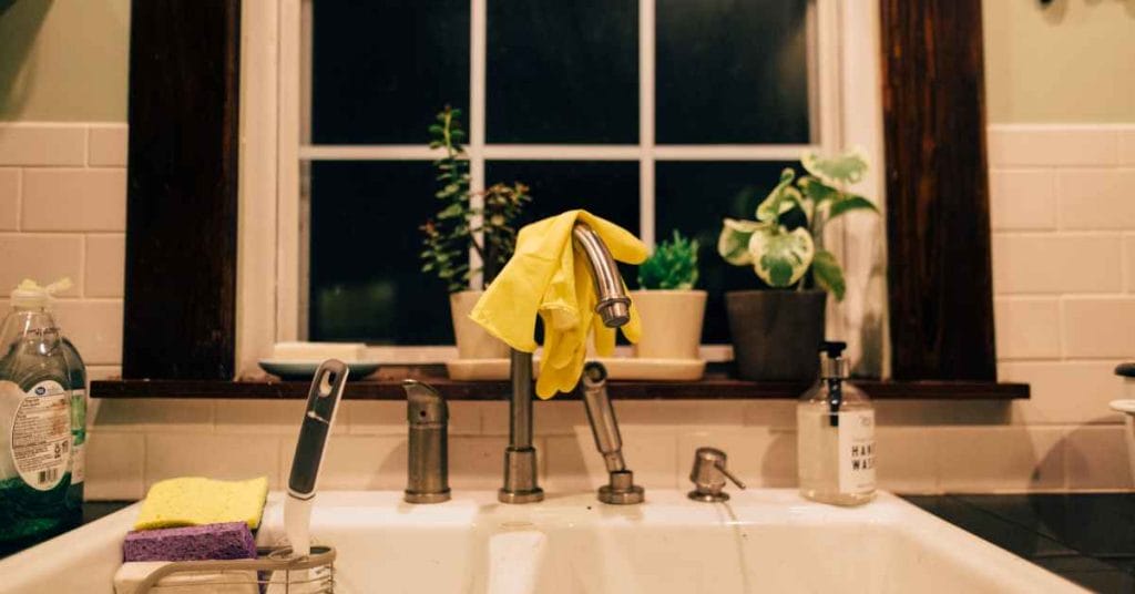 a kitchen sink installed under the window